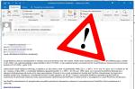 Znak ostrzegawczy na tle fałszywego e-maila
